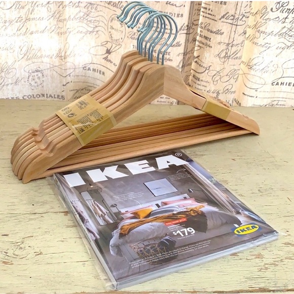 IKEA Other - 8 pc IKEA Natural Wood Hangers with  discounted catalog (last issue ever made!)